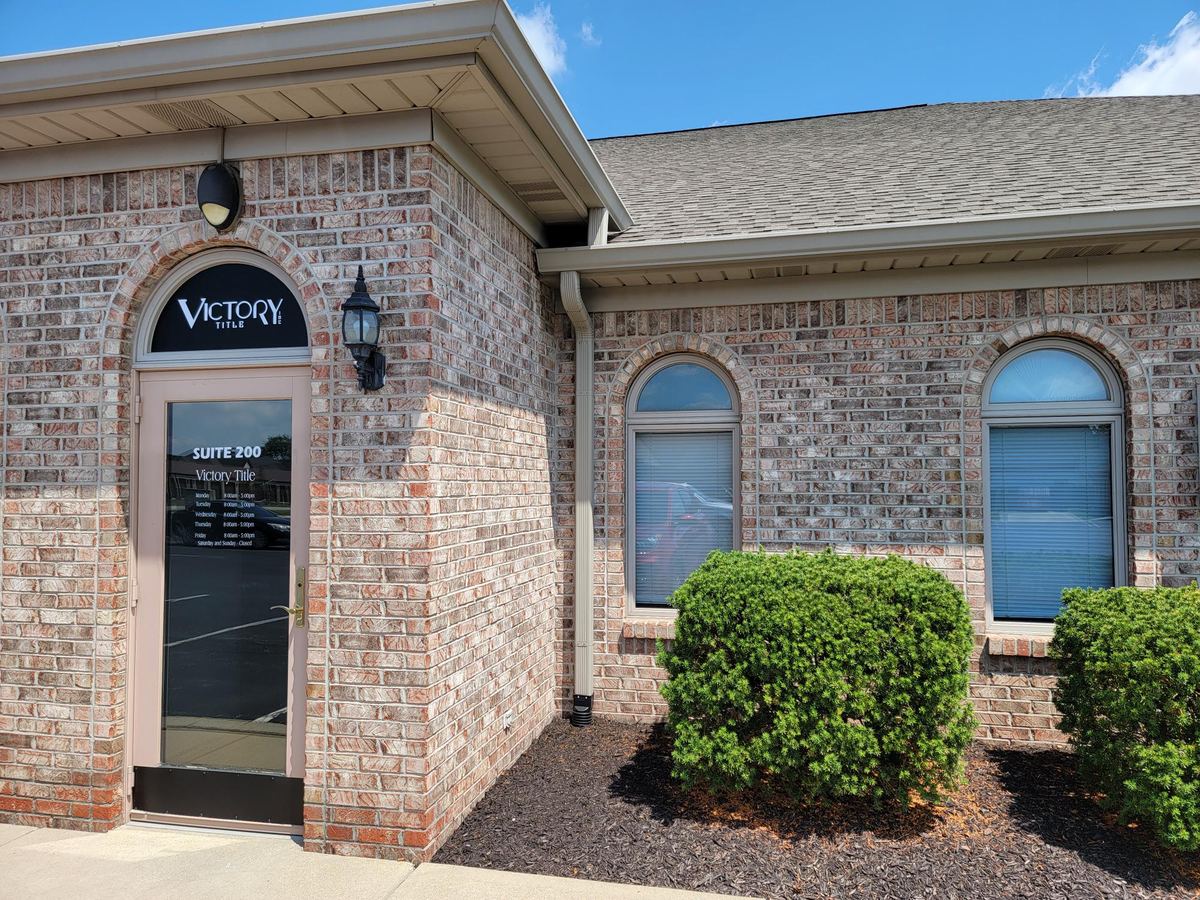 Brick exterior and entrance of the Victory Title office in Brownsburg, Indiana